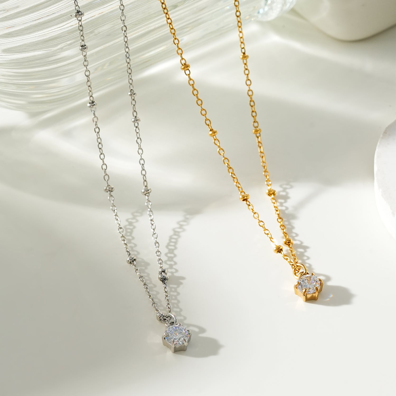 KADIRI Gold:  Solitaire Zirconia Charm Pendant on a Beaded Chain Necklace